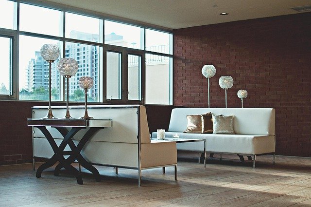 Modern apartment living room with clean lines, neutral tones, and practical decor in a compact space.