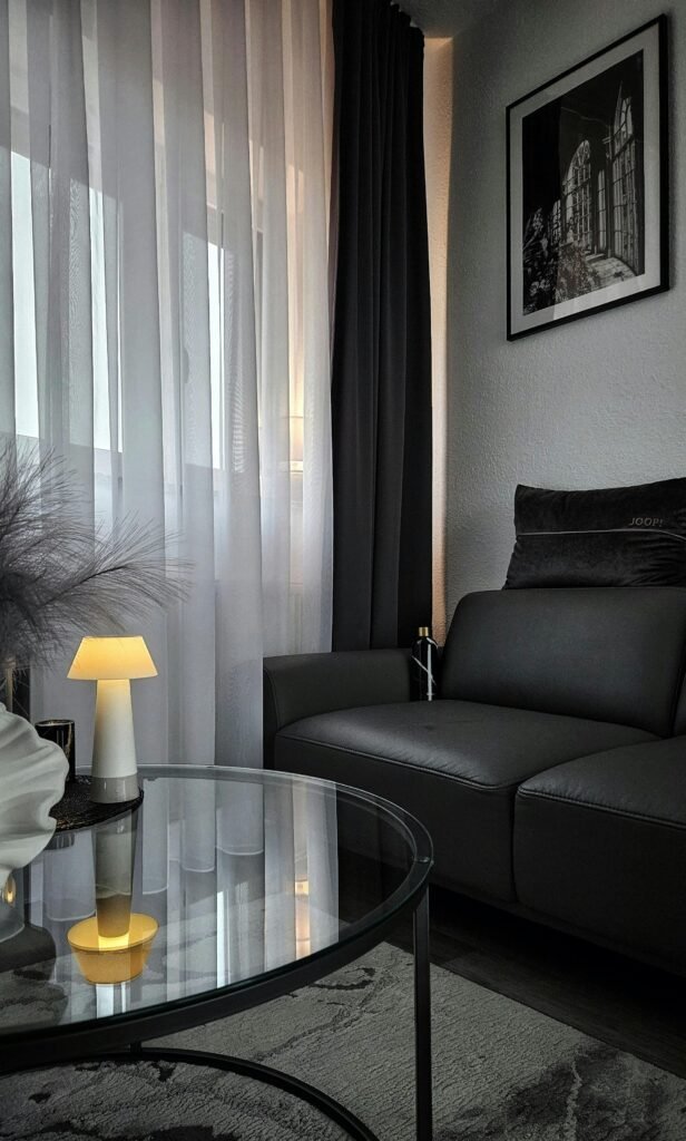 Cozy living room ideas featuring a warm, inviting space with soft seating, layered textiles, and gentle lighting for a comfortable atmosphere.