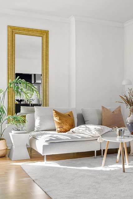 Bright living room with stylish furniture and decor showcasing modern living room decor ideas.