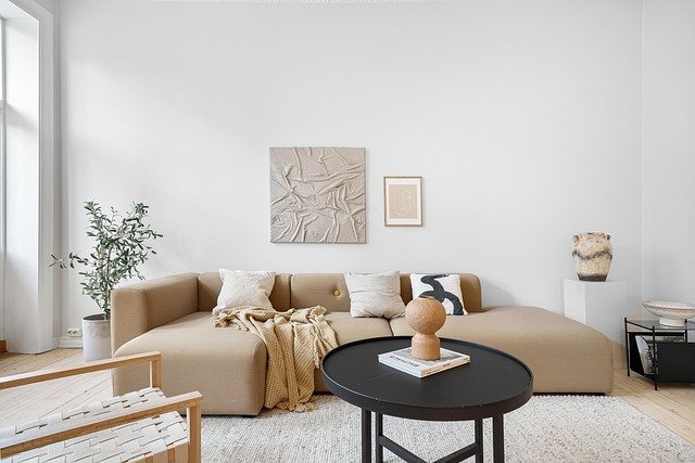 "Stylish living room with modern furniture, neutral tones, and cozy decorative accents."