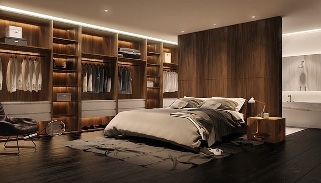 "Elegant master bedroom with modern decor, warm lighting, and neutral tones creating a cozy retreat.