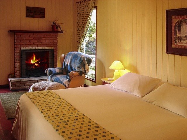 Cozy master bedroom with warm lighting, neutral tones, and elegant furniture for modern home inspiration