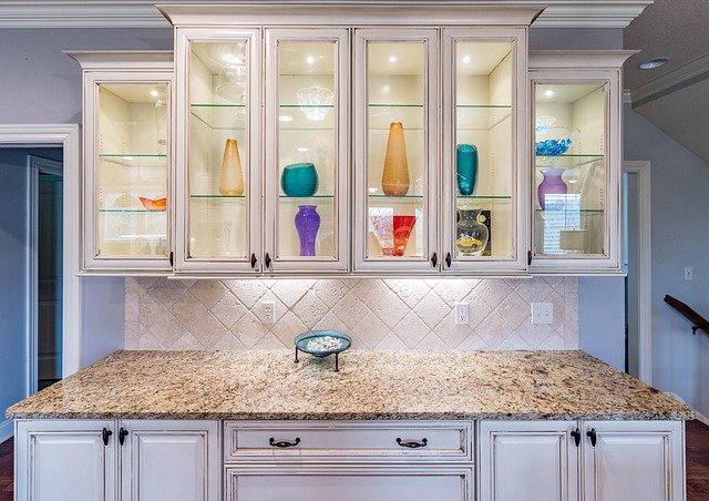 Small kitchen decor ideas featuring stylish kitchen cabinets with a compact design, clean lines, and efficient storage for small spaces.
