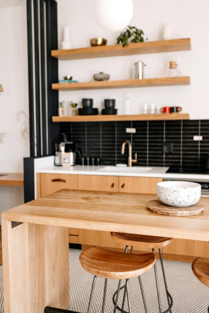 Modern U-shaped kitchen layout with spacious countertops, upper cabinets, and efficient work zones reflecting current kitchen layout trends.
