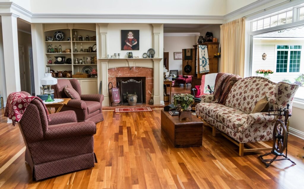 Modern living room with floating shelves displaying books and décor