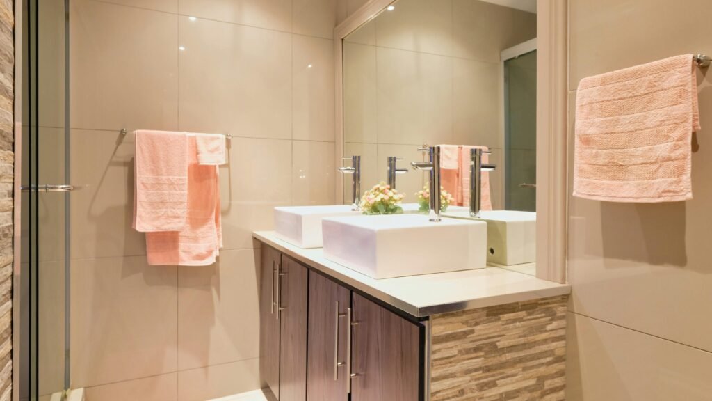 Stylish bathroom with modern vanity and storage units, functional cabinets for the bathroom