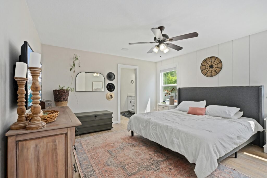 wall art for bedroom with modern decor, soft lighting, and clean interior design