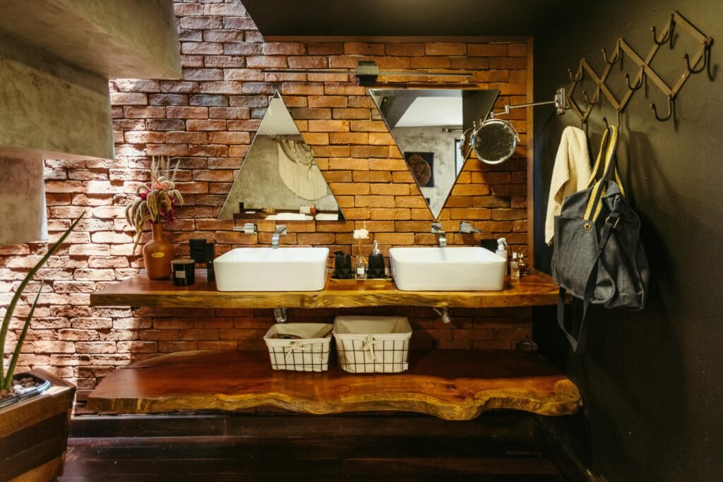 Bedroom vanity setup with mirror, lighting, and organized makeup items on a clean table