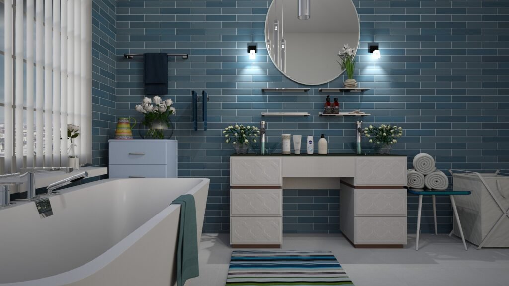 Modern bathroom with large format tiles on walls and floor creating a clean, spacious, and seamless appearance.