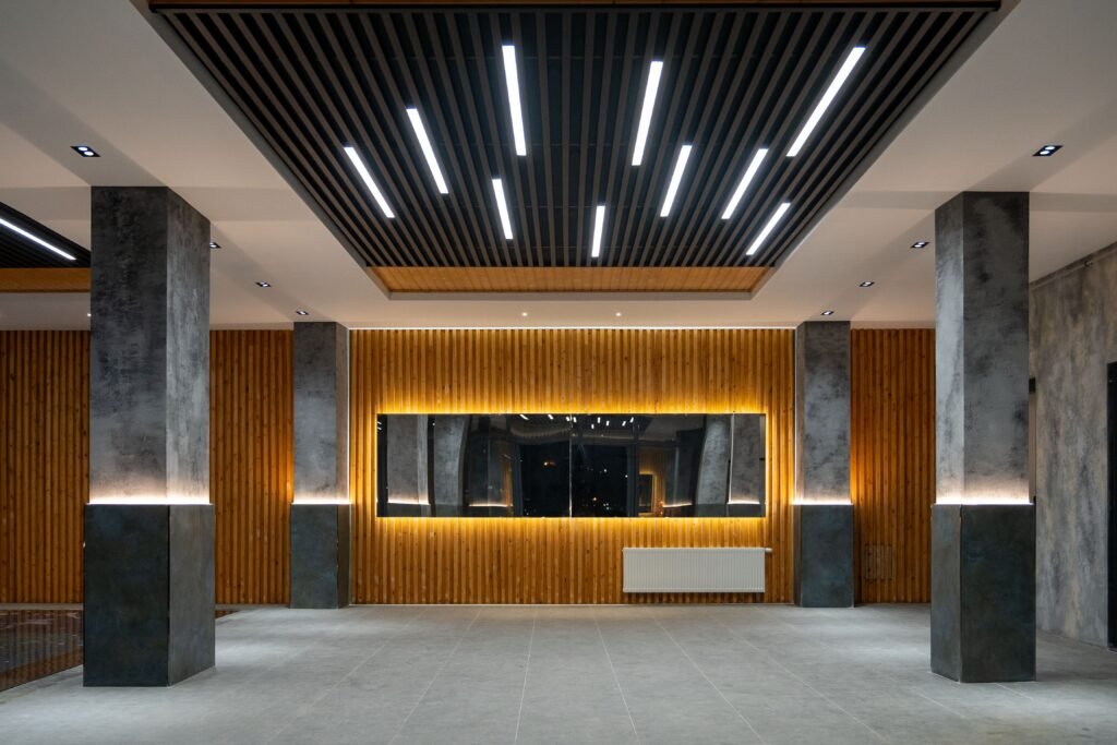 Coffered ceiling ideas with LED lighting featuring recessed panels, hidden LED strips, and modern illumination that highlights architectural details.