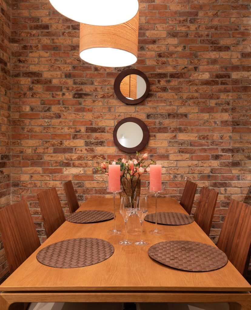 Cozy dining room with layered textures, soft textiles, and warm lighting inspired by modern dining room ideas.