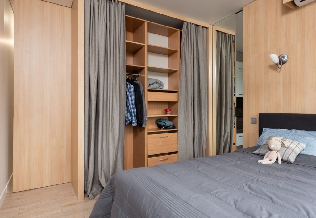 Master bedroom design ideas featuring built-in storage, organized cabinetry, a stylish bed, and a clutter-free modern bedroom.