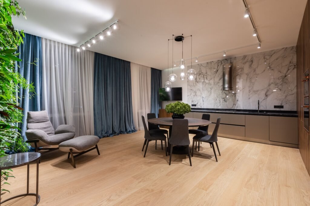 warm and cozy Living room with floor-to-ceiling curtains that add warmth, softness, and elegance to the space