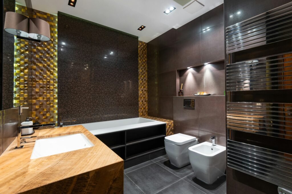 Small modern bathroom with vertical storage shelves, wall-mounted cabinets, and space-saving organization solutions.