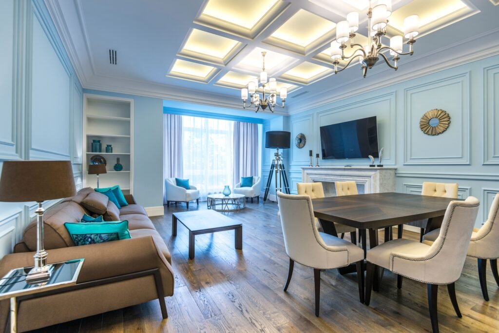 Coffered ceiling lighting ideas featuring recessed lights, pendant fixtures, and elegant beams that highlight the ceiling's architectural design.