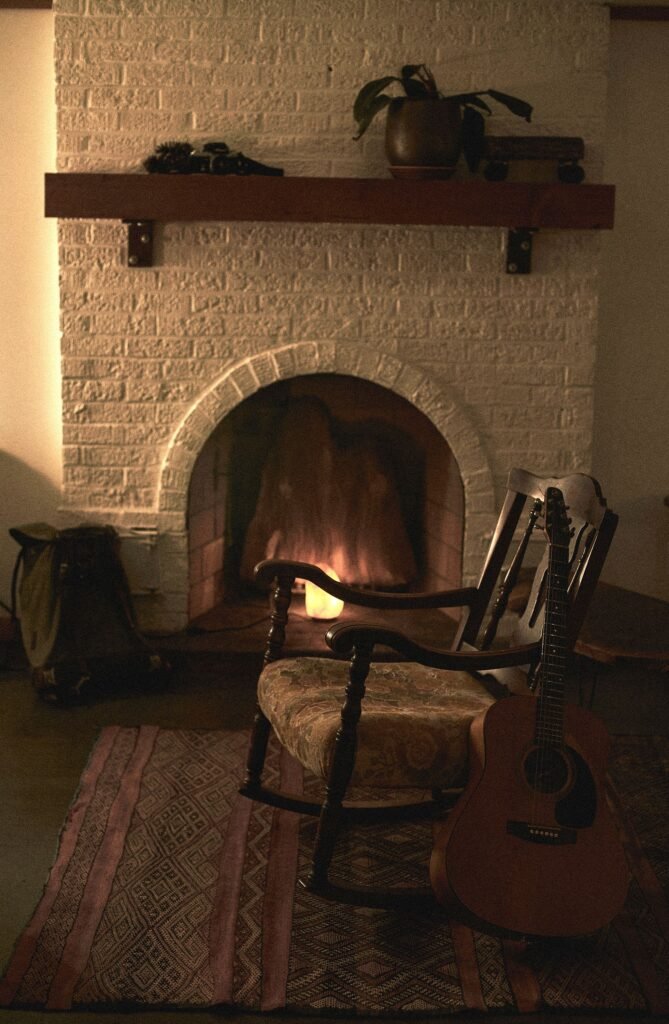 warm and cozy Living room featuring a fireplace setting with comfortable seating arranged around a warm focal point
