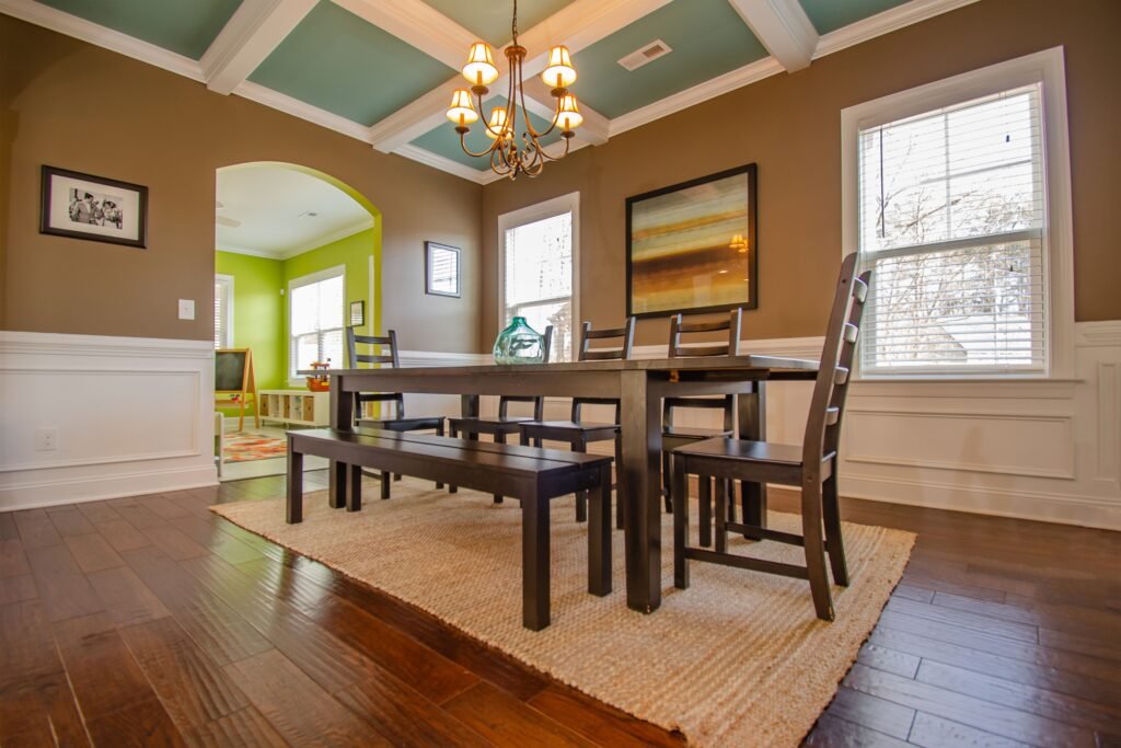 Elegant coffered ceiling with recessed square panels, clean trim details, and a timeless architectural design that adds depth and character to the room.