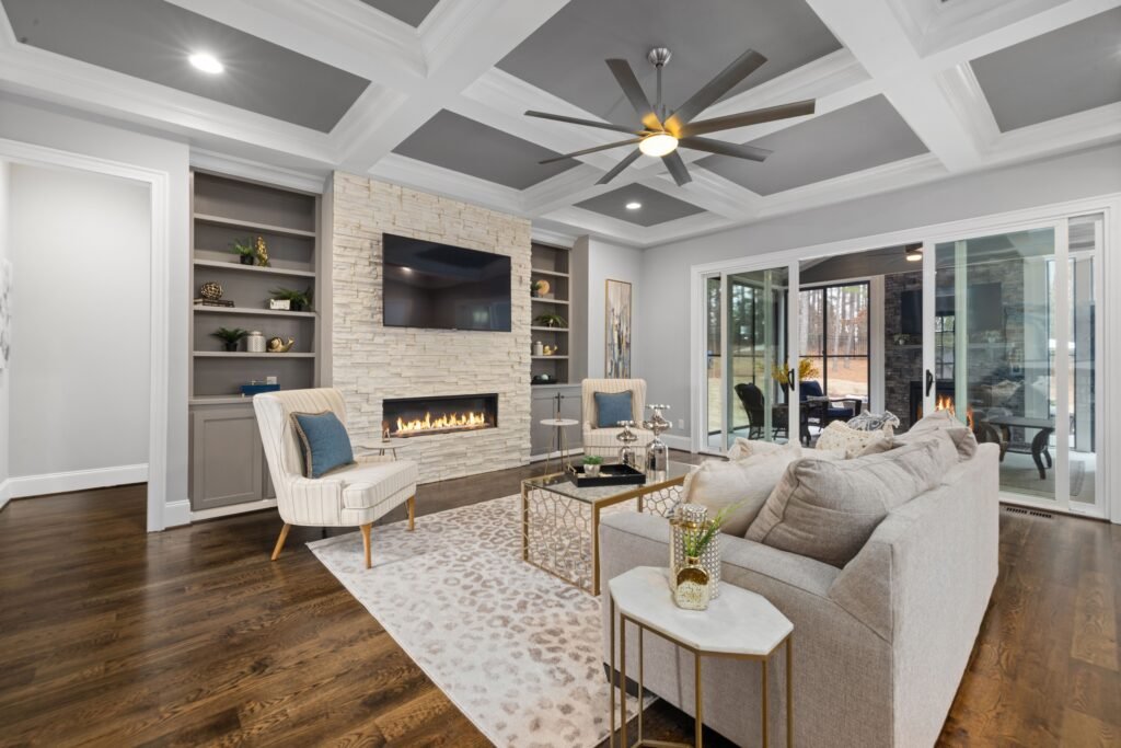 Space-saving coffered ceiling design in a small room with shallow recessed panels and clean lines that create depth without overwhelming the space.