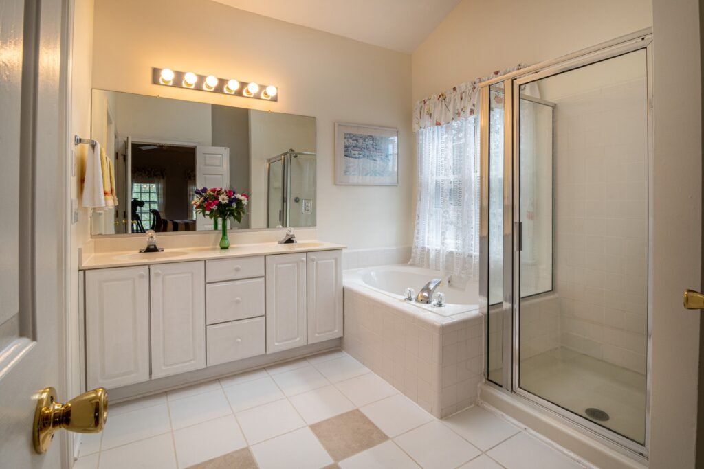 Modern bathroom ideas featuring a luxury walk-in shower with frameless glass enclosure, floating vanity, freestanding bathtub, and elegant contemporary finishes.