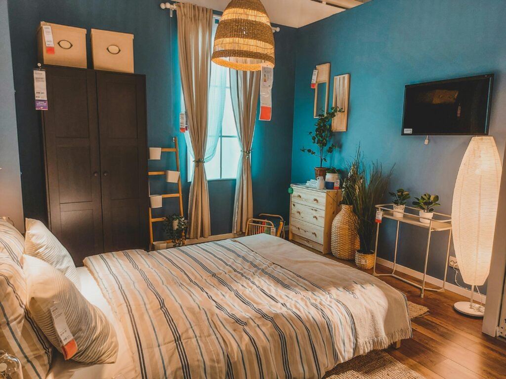 Affordable house in the USA featuring bedroom decorating ideas with textured rugs, woven storage baskets, and cozy budget-friendly decor elements.