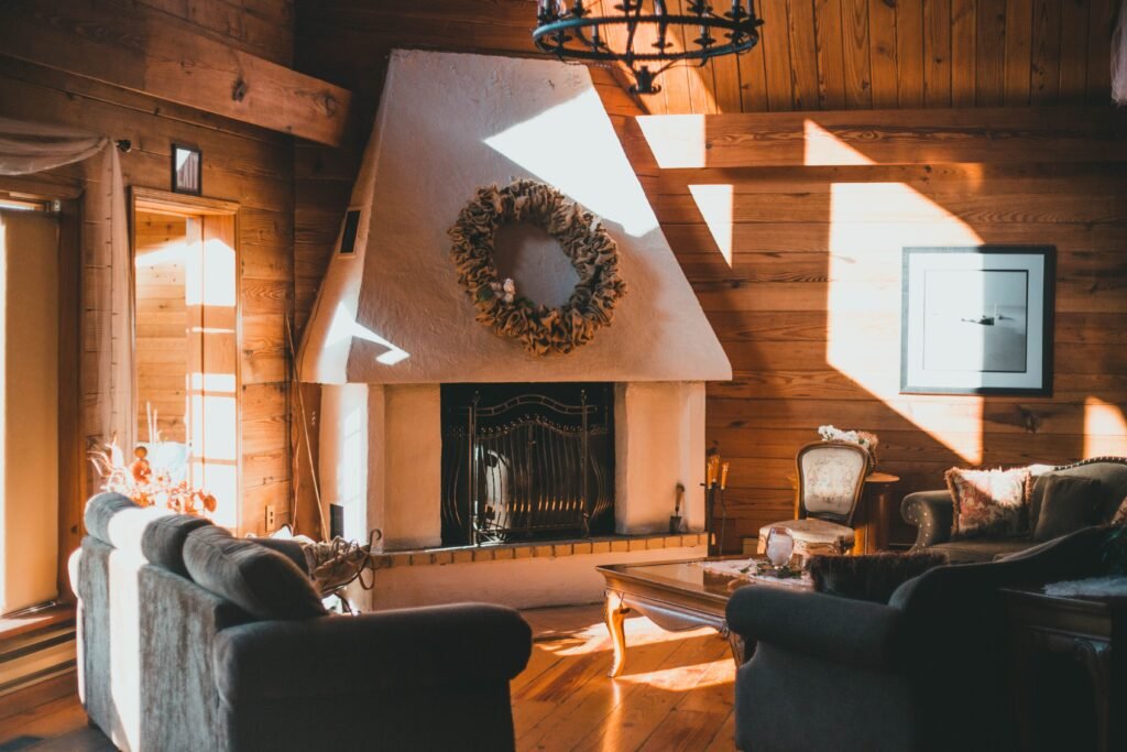 warm and cozy Living room filled with natural light from large windows, creating a bright and cozy atmosphere
