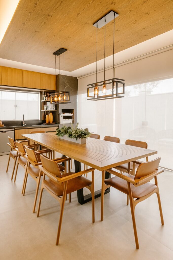 Minimal modern dining room featuring simple furniture, a sleek dining table, comfortable chairs, neutral decor, and a clutter-free layout inspired by modern dining room ideas.