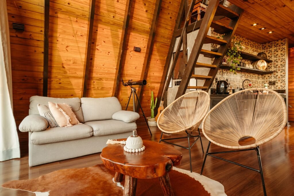 warm and cozy Living room featuring natural wood tones in furniture, flooring, and decor for a warm and inviting atmosphere