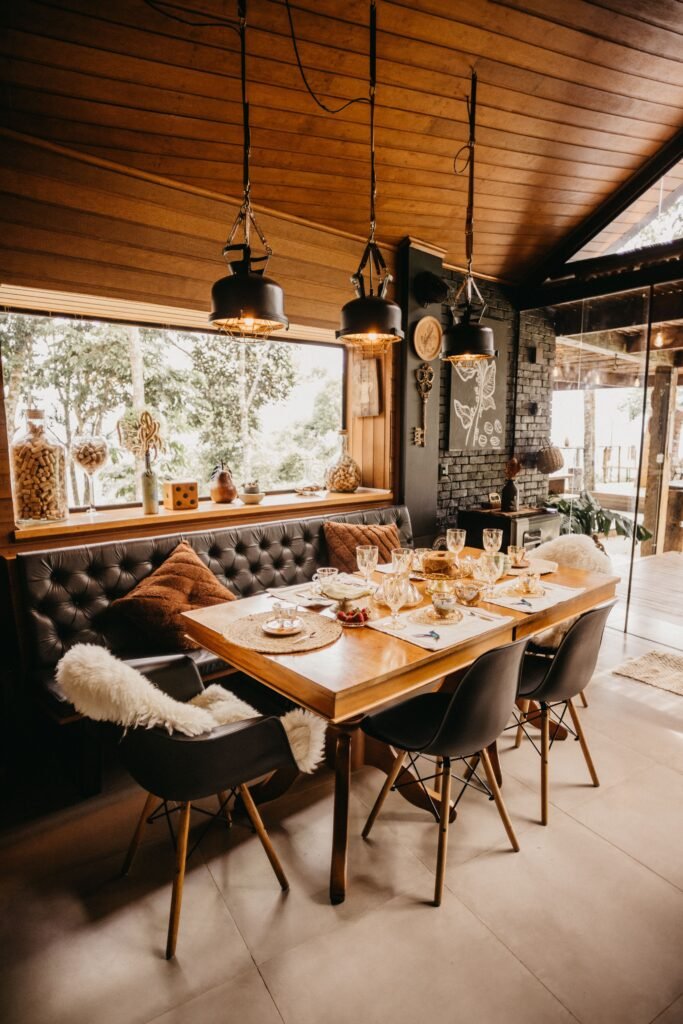 Luxury dining room featuring a marble dining table, velvet chairs, statement chandelier, and elegant decor inspired by modern dining room ideas.