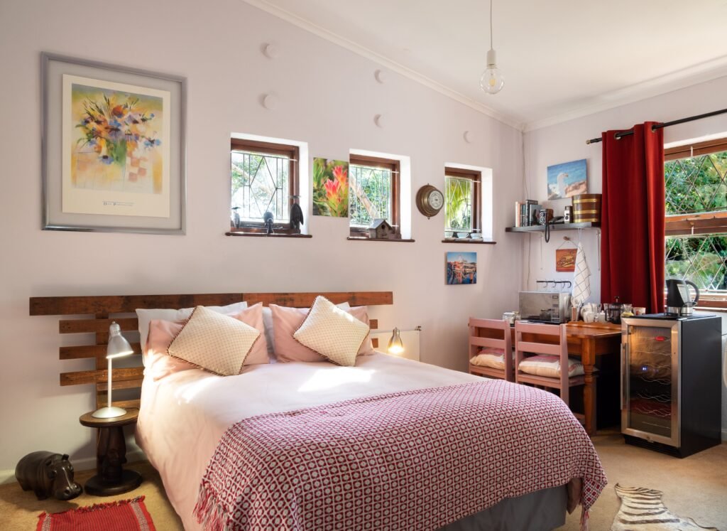 Affordable bedroom featuring a bed with built-in drawers, matching furniture, and smart storage solutions from the most affordable bedroom furniture sets 2026.