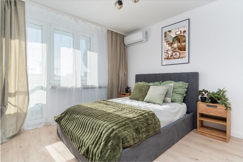 Affordable bedroom with a stylish bed, matching nightstands, and simple decor showcasing one of the most affordable bedroom furniture sets 2026.