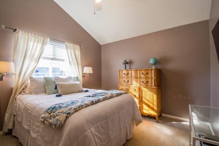 Affordable house on a budget in the USA featuring cozy bedroom decorating ideas with simple furnishings, neutral colors, and budget-friendly decor.