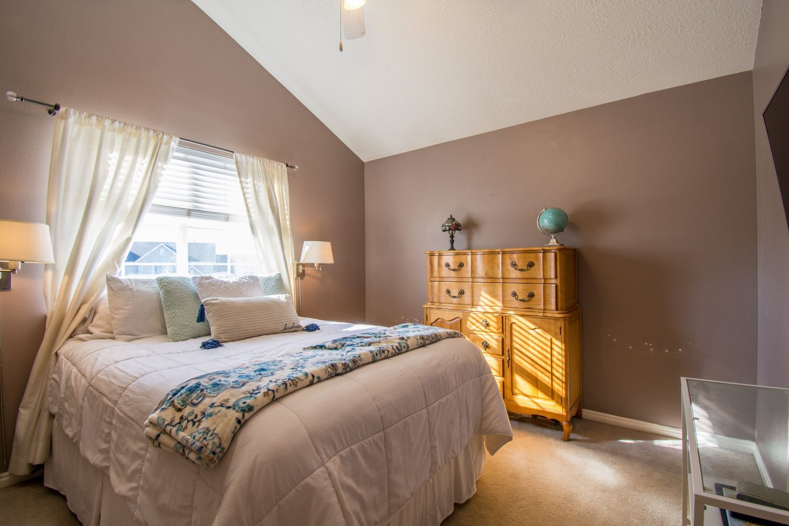 Affordable house on a budget in the USA featuring cozy bedroom decorating ideas with simple furnishings, neutral colors, and budget-friendly decor.