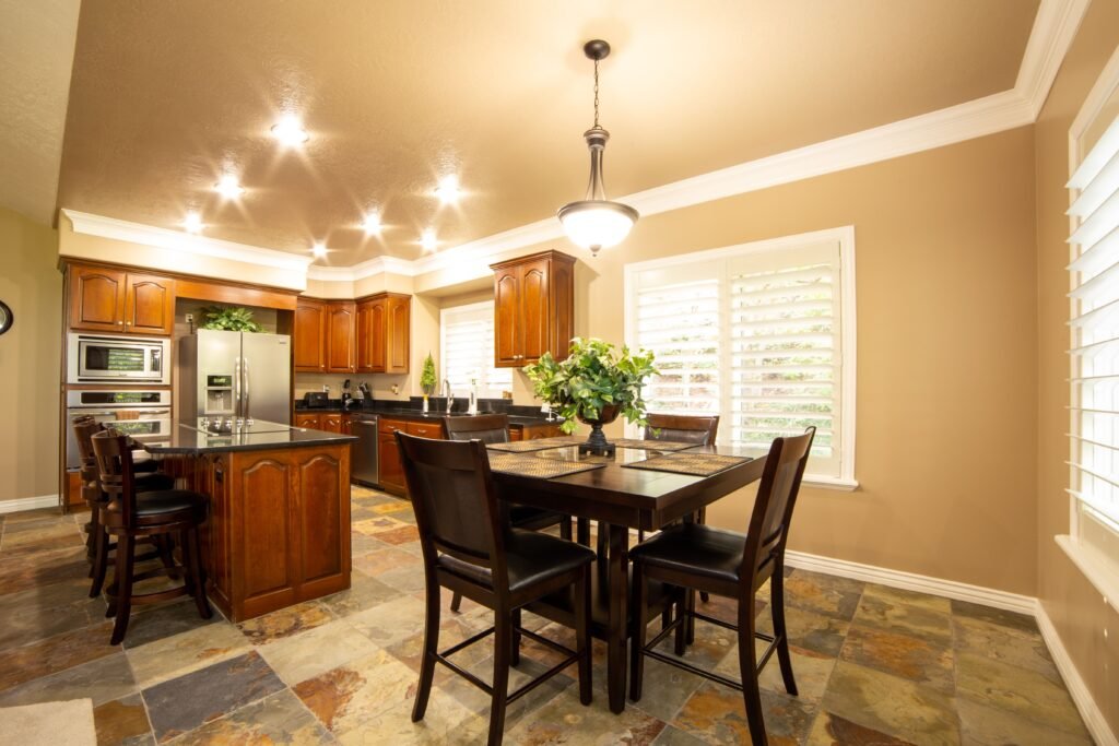 Coffered ceiling ideas for kitchen featuring recessed panels, decorative beams, and elegant lighting that add depth and style.