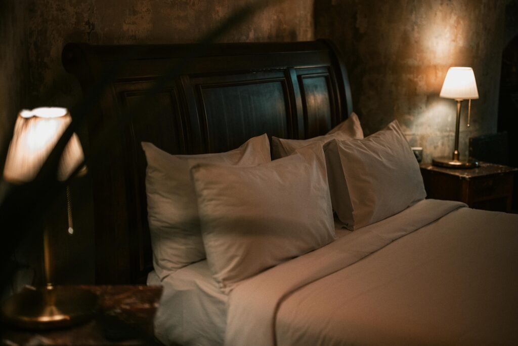Master bedroom design ideas featuring extra soft lighting, warm ambient glow, elegant furnishings, and a relaxing bedroom atmosphere.