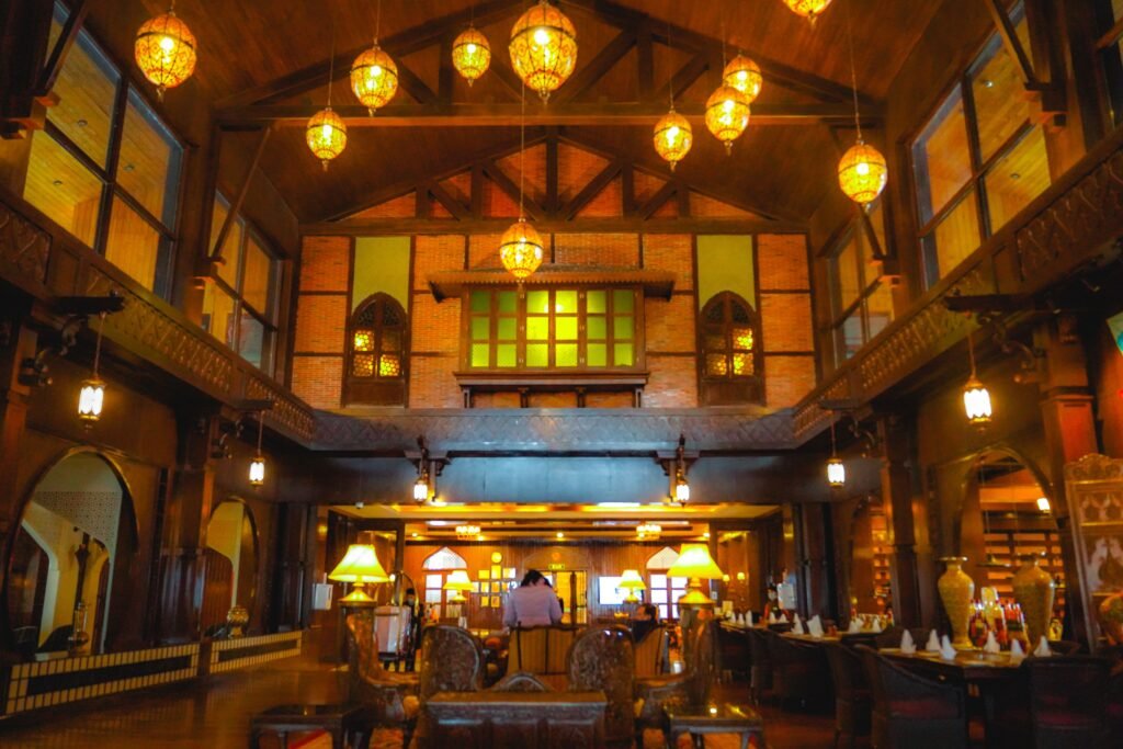 Modern coffered ceiling with recessed panels, decorative beams, and built-in LED lighting creating a warm and elegant ambiance.