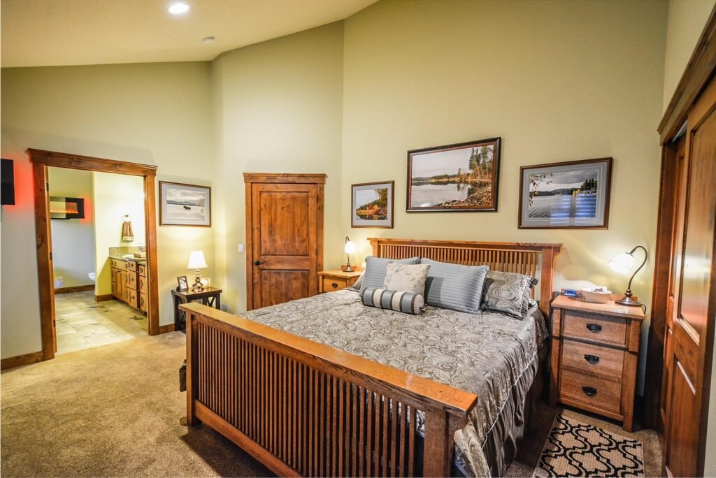 Master bedroom design ideas featuring warm bulb lighting, cozy bedding, elegant furnishings, and a soft ambient glow.